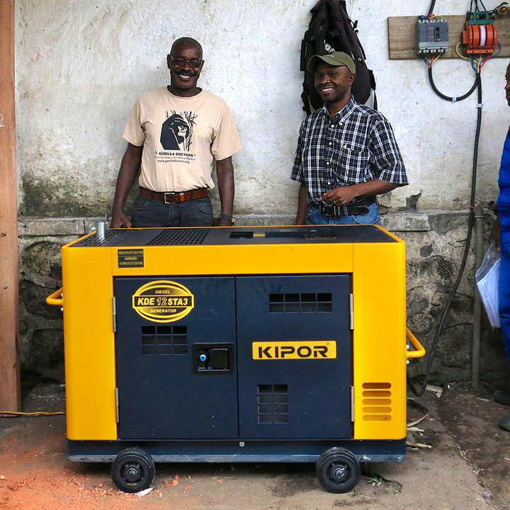 DRC Administrator Dr. Jacques and Employee Health Program Manager Jean-Paul Lukusa with the new generator in Goma.