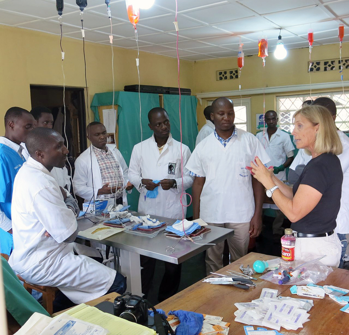 Dr. Donna Shettko speaks with Gorilla Doctors field veterinarians in the Musanze laboratory.
